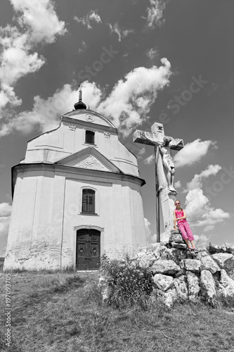 Slovakia - The Holy cross baroque chapel on the hill Siva brada in Spis region and little girl. photo