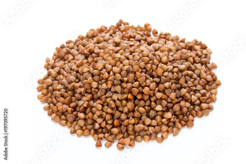 Buckwheat grains isolated on the white background.
