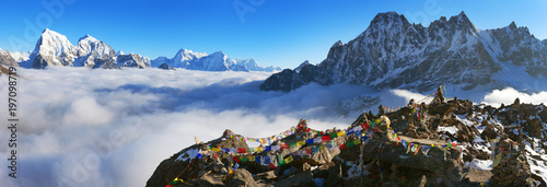 view from Gokyo Ri with prayer flags.. photo