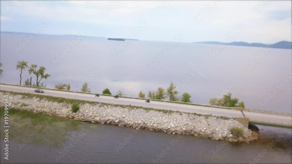 motorcycles cross bridge over gorgeous scenic vermont wide aerial motorcycles cross bridge over gorgeous scenic vermont wide aerial