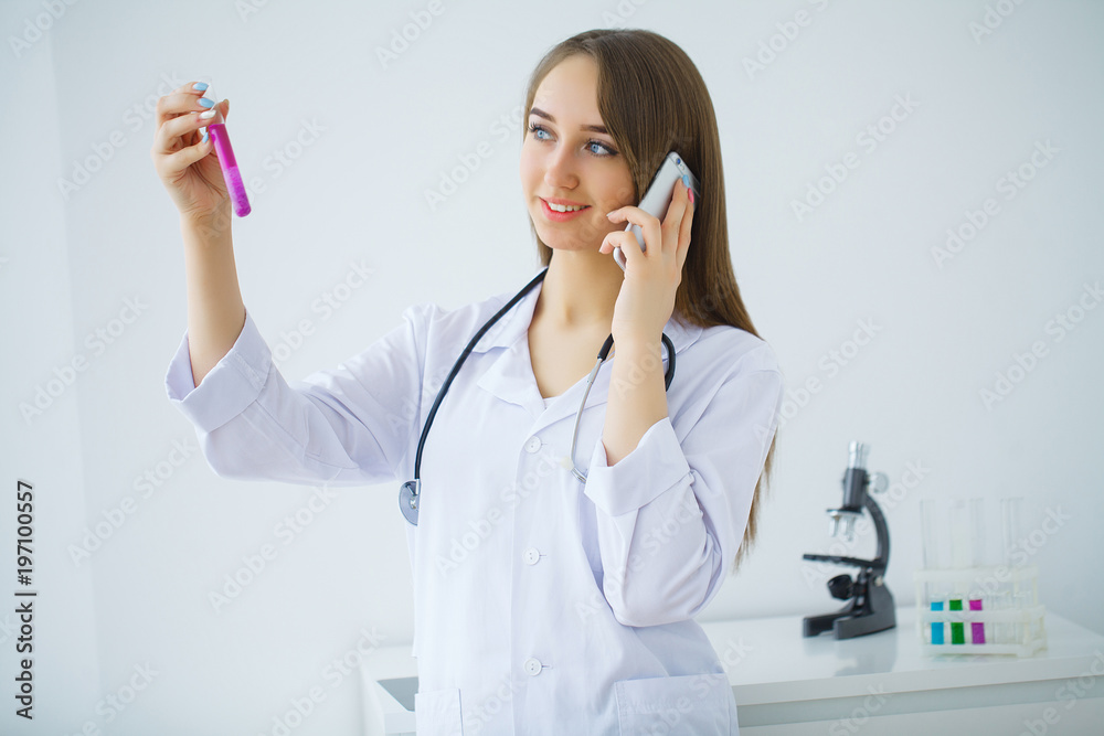 Young scientist pipetting in life science laboratory. Young scientist pipetting in life science laboratory.