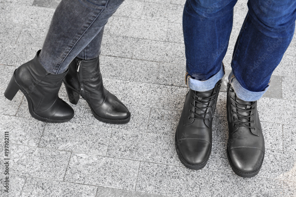 Couple in stylish shoes on city street