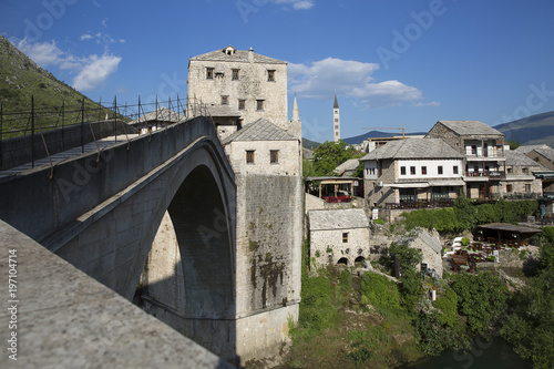 View of the single-arch Old Bridge or Stari Most Neretva over River in Mostar, Bosnia and Herzegovina. The Old Bridge was destroyed in 1993 by Croat military forces during the Croat–Bosniak War. 