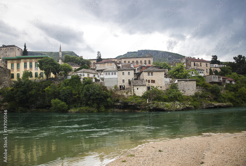 View of Old Town Mostar from the bank of Neretva River, Bosnia and Herzegovina.