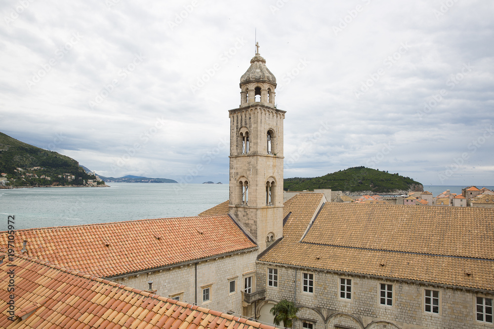 Saint Dominic Church bell tower and red roofs of the  Dominican Monastery in old town Dubrovnik, Croatia