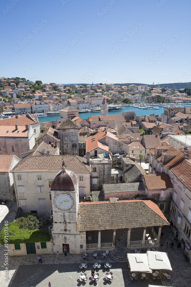 Aerial view from the bell tower of Saint Lawrence Cathedral in Trogir ( with the city clock tower and loggias on Saint Lawrence square, Croatia