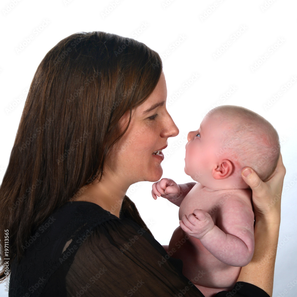 Newborn Baby Facing Mother on a White Backdrop Newborn Baby Facing Mother on a White Backdrop