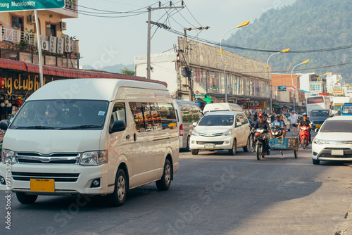 White Cars in asia bus and bikes thailand street peoples summer time photo