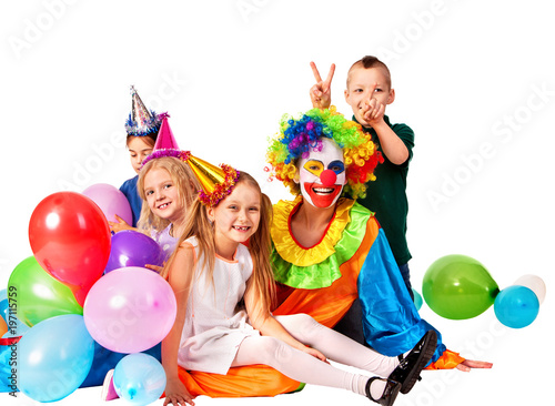 Birthday child clown playing with children and bunny fingers prank. Kid holiday cakes celebratory and balloons the happiest birthday. Mom arranged holiday for her daughter.