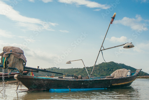 Tropical Thai jungle lake Cheo lan wood boat  wild mountains nature national park ship yacht rocks