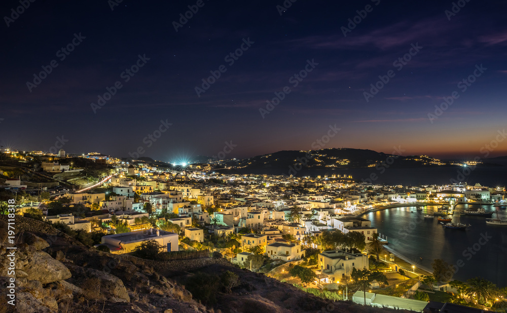 Mykonos island aerial panoramic view at night. Mykonos is a island, part of the Cyclades in Greece