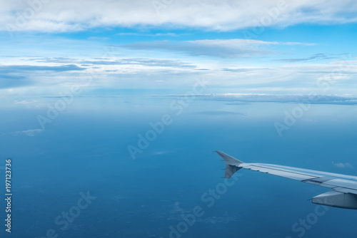 airplane wing view in the air