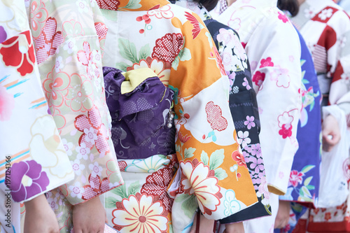 Young girl wearing Japanese kimono standing in front of Sensoji Temple in Tokyo, Japan. Kimono is a Japanese traditional garment. The word "kimono", which actually means a "thing to wear" © zasabe