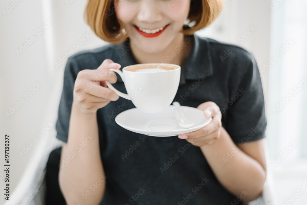 Young Businesswoman Having a Coffee Break. Young Businesswoman Having a Coffee Break.
