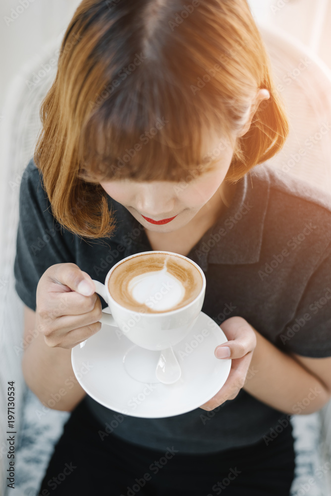 Young Businesswoman Having a Coffee Break. Young Businesswoman Having a Coffee Break.