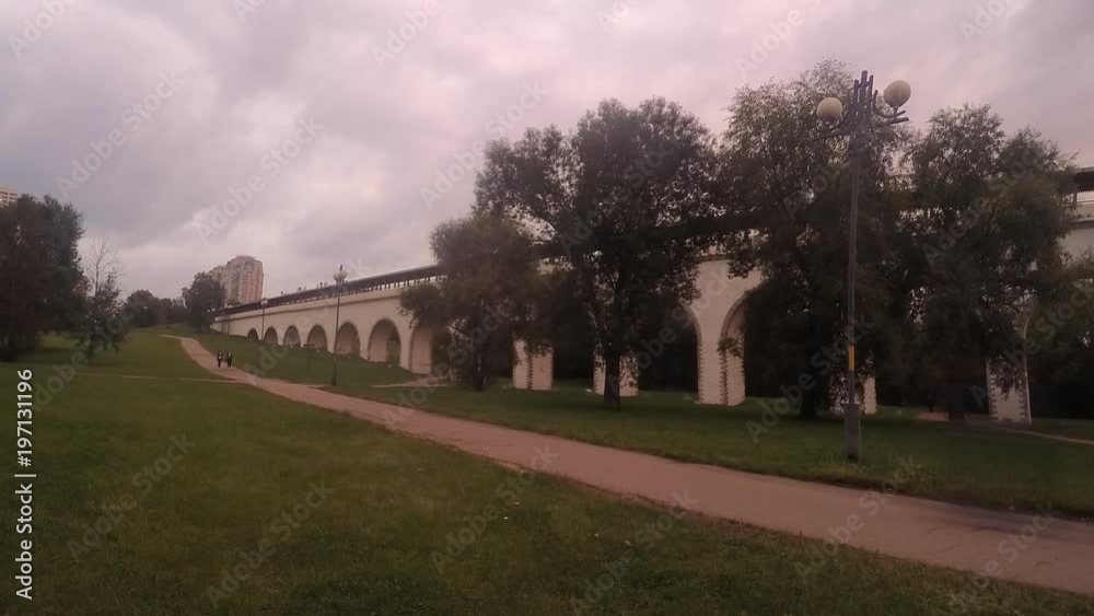 Ancient aqueduct in the city park in the evening timelapse Ancient aqueduct in the city park in the evening timelapse