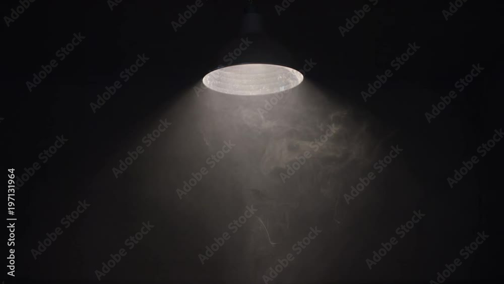 Hanging Swaying Lamp On Dark Room. Shot On Red Cinema Camera In Slow Motion.