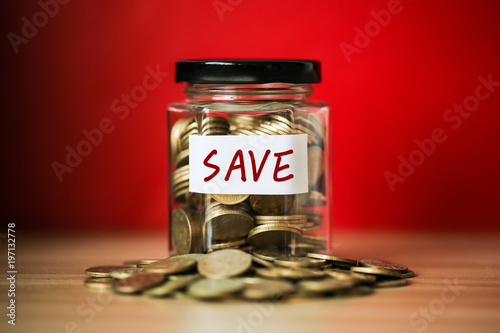 Save Money Concept Coins In Glass Jar