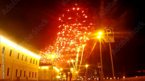 colorful fireworks over houses in the city timelapse