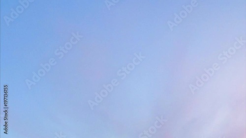 pink clouds in the blue evening sky timelapse