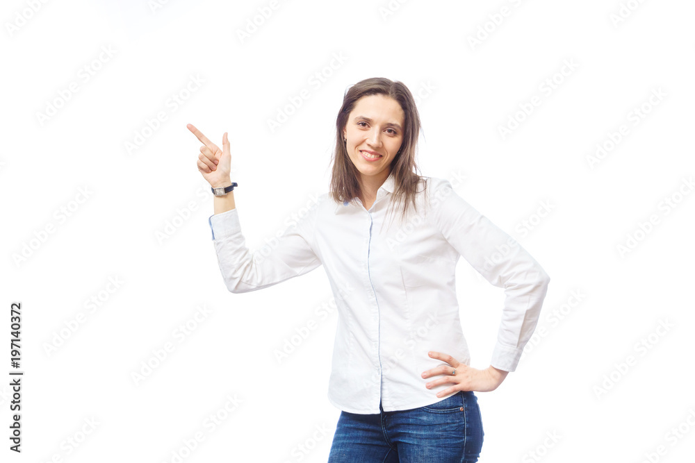 beautiful woman showing a finger at something, on a white background in the studio beautiful woman showing a finger at something, on a white background in the studio