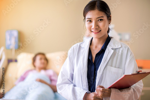 Doctor with blur patient background