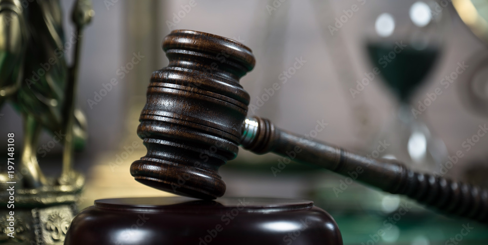Law and Justice concept. Gavel of the judge, books, scales of justice. Brown background, Courtroom theme. Law and Justice concept. Gavel of the judge, books, scales of justice. Brown background, Courtroom theme.