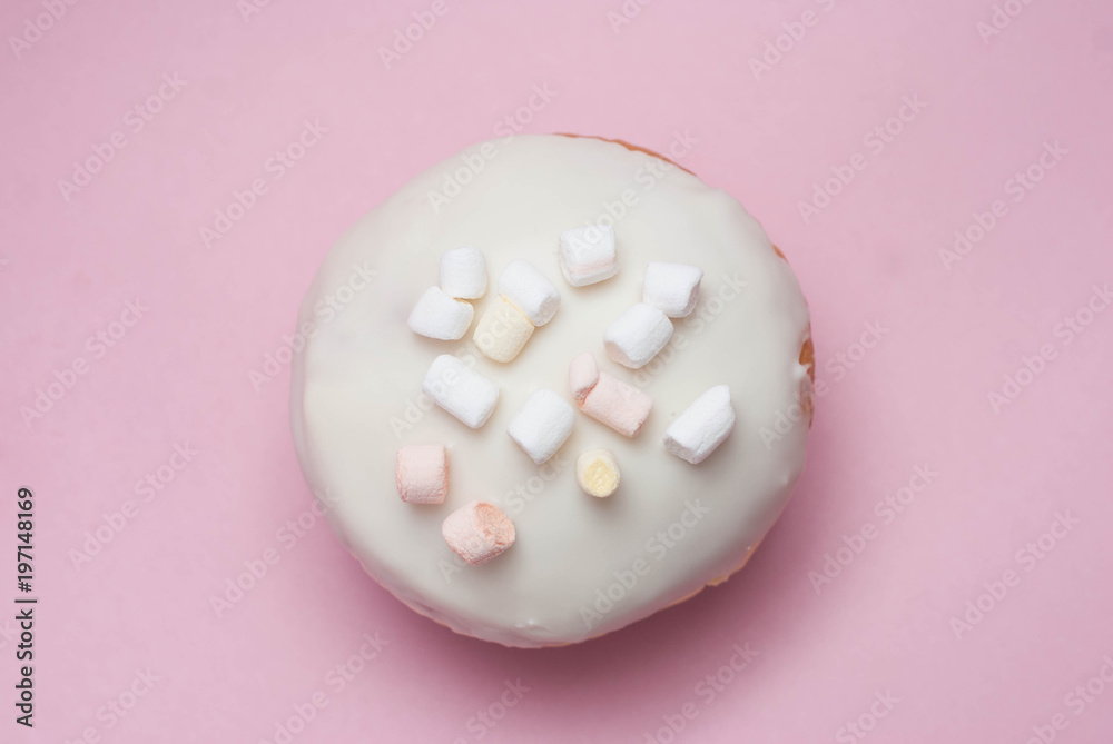 Doughnut with White Cream on Pink background. Sweet and Dessert Doughnut Isolated with copy space. Doughnut with White Cream on Pink background. Sweet and Dessert Doughnut Isolated with copy space.