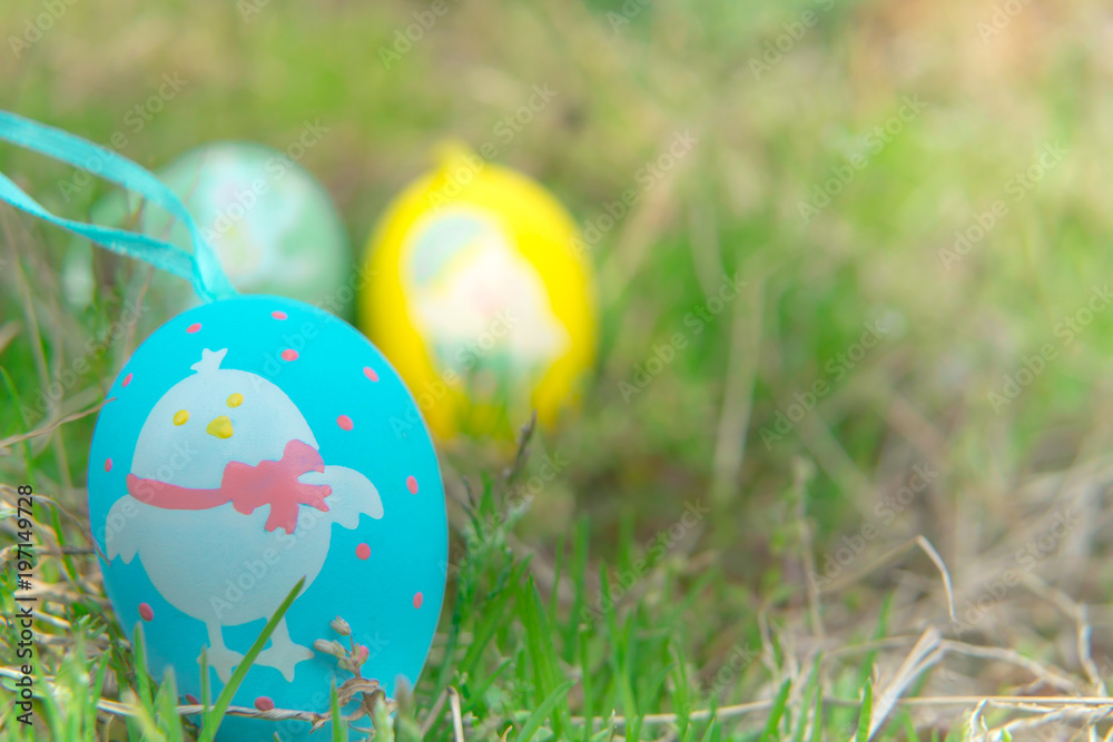 colorful easter eggs hiding on the grass, ready for the egg hunter traditional