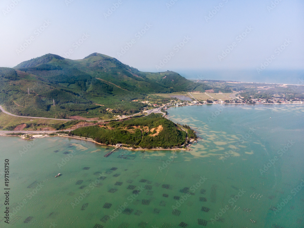 Drone shot of mountains and lake in Vietnam Drone shot of mountains and lake in Vietnam