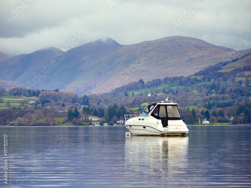 Yachts on still waters at a marina at lake windermere, England UK.