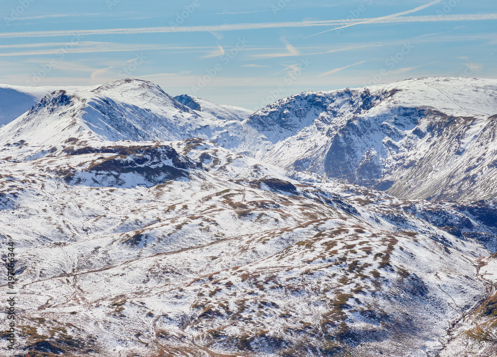 Snow covered mountains of Stony Cove & High Street in the Lake District, England, UK.