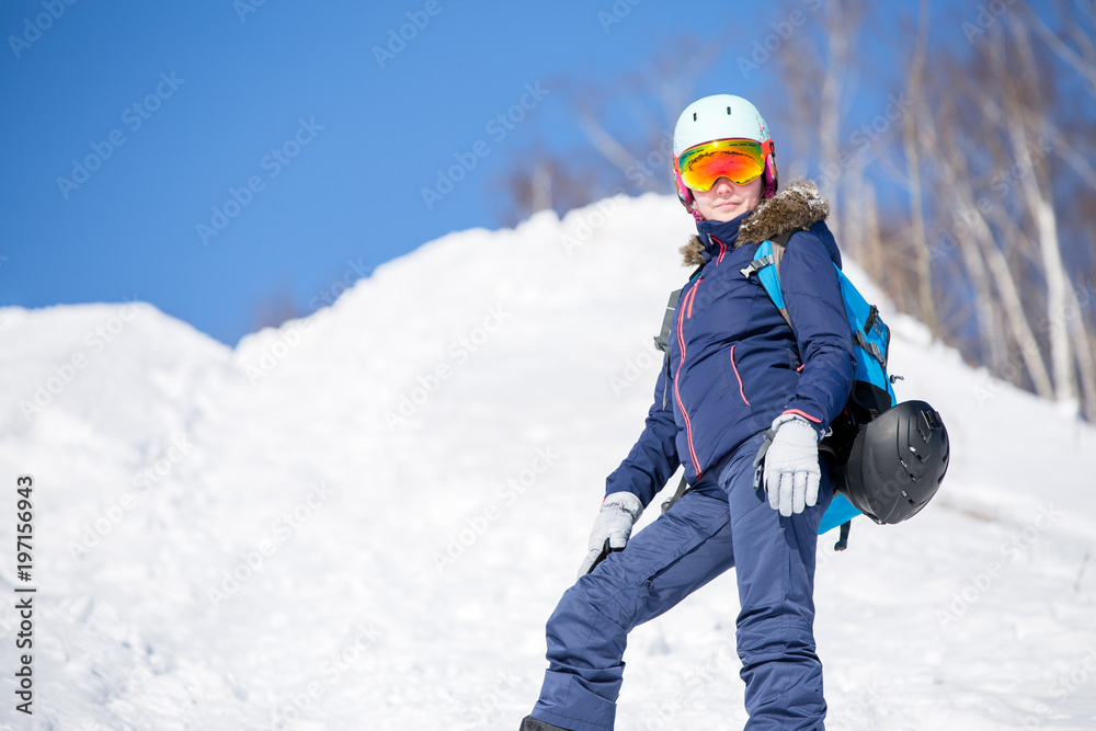 Photo of female athlete in helmet during winter