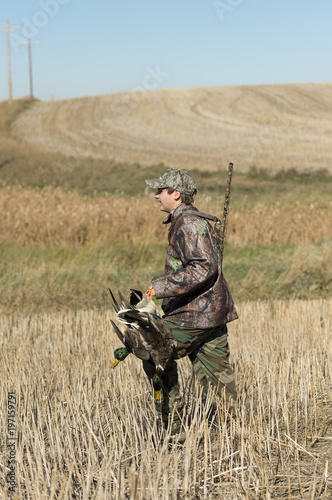 A Duck Hunter with a Drake Mallard in Norh Dakota