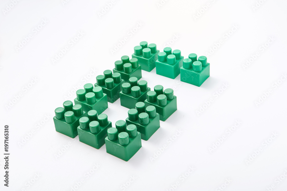 Fototapeta premium figures from a colored cubes designer on a white background