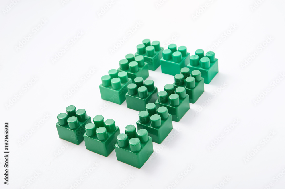 Fototapeta premium figures from a colored cubes designer on a white background