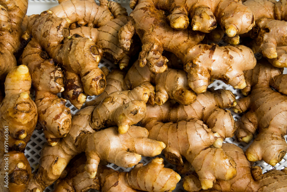 Fresh organic ginger background texture top viwe