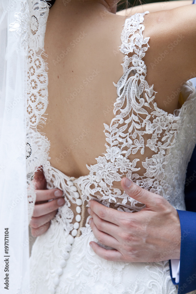detail of the back of the bride