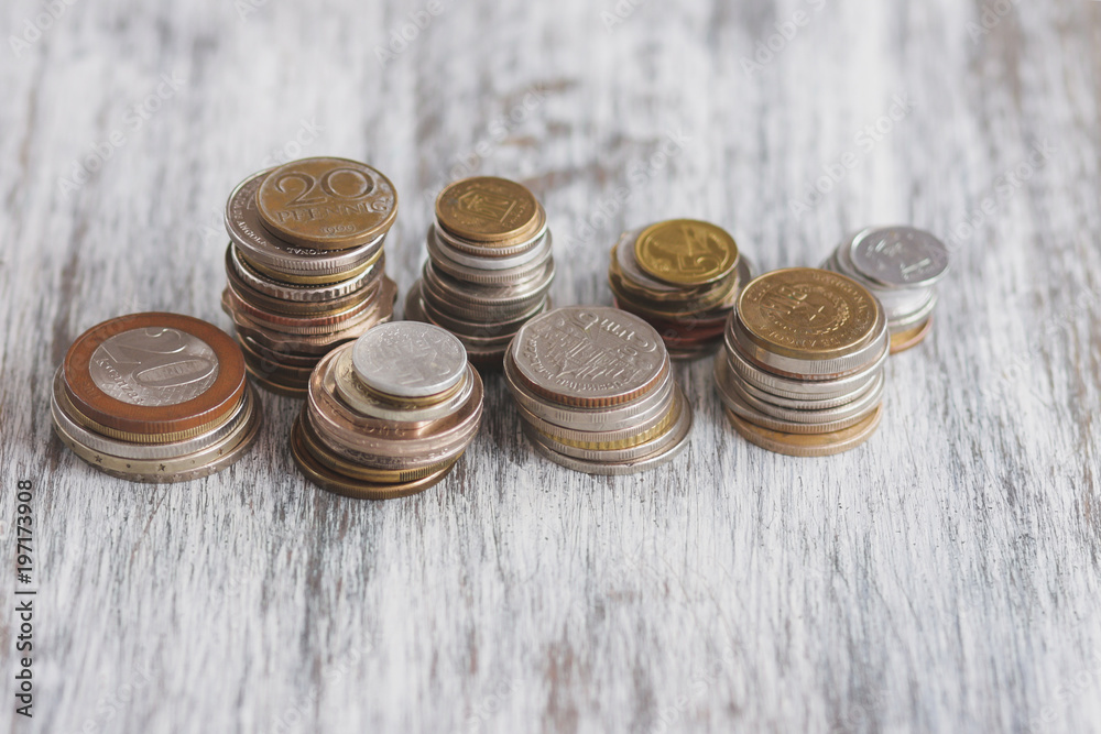 Different collector coins on the wooden background Different collector coins on the wooden background