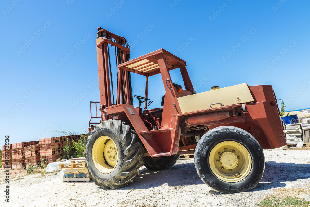 Old forklift in a construction site in Sicily, Italy