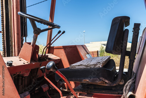 Tablou pe pânză Old forklift in a construction site in Sicily, Italy