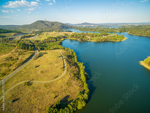 Aerial panorama of Lake Burley Griffin, Tuggeranong parkway, and iconic Telstra Tower in Canberra, ACT, Australia photo