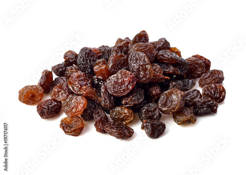Dried raisins on white background.