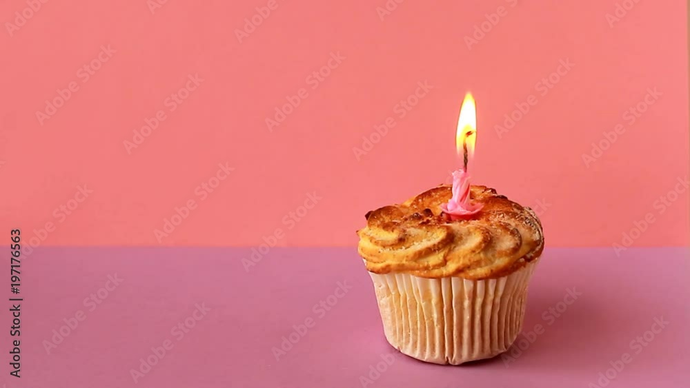 One lighted candle on birthday cake. Time lapse video One lighted candle on birthday cake. Time lapse video