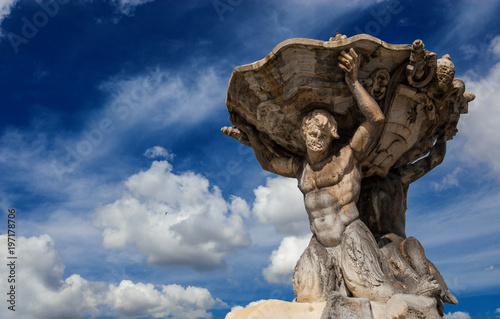 Fountain of the Tritons, beautiful baroque fountain completed in 1715, in the center of Forum Boarium square, in Rome (with clouds)