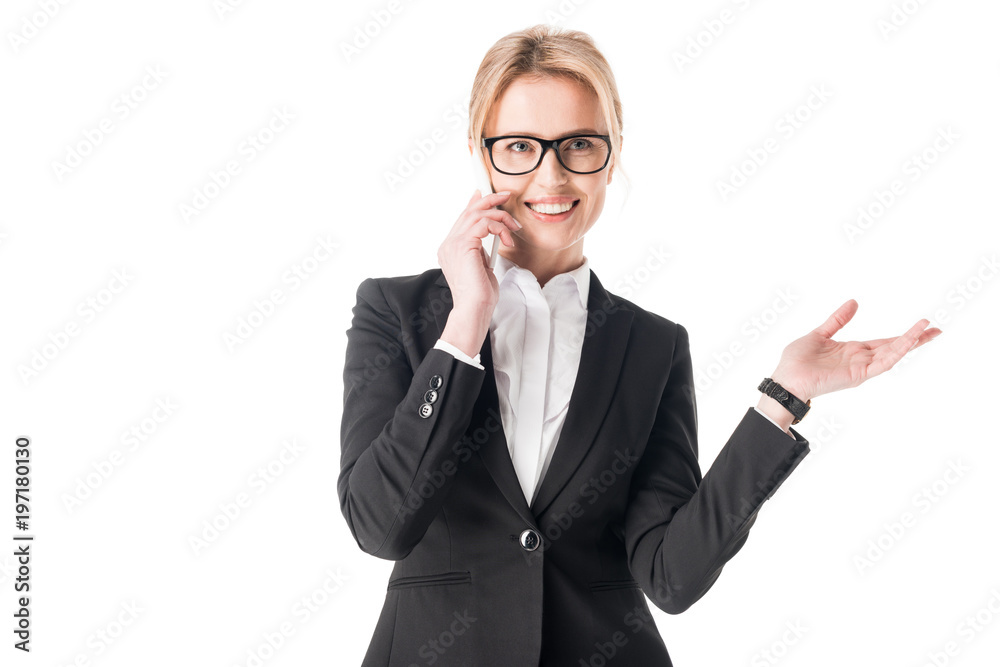 Blonde businesswoman talking on smartphone isolated on white Blonde businesswoman talking on smartphone isolated on white