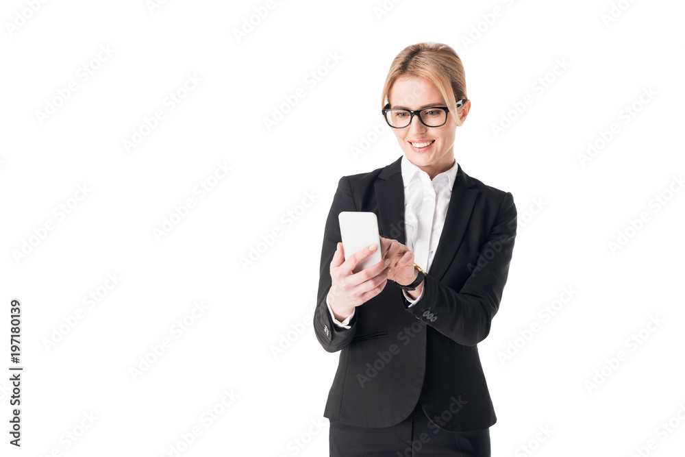 Smiling businesswoman using smartphone isolated on white Smiling businesswoman using smartphone isolated on white