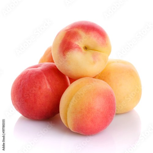 Close-up view of fresh peaches isolated