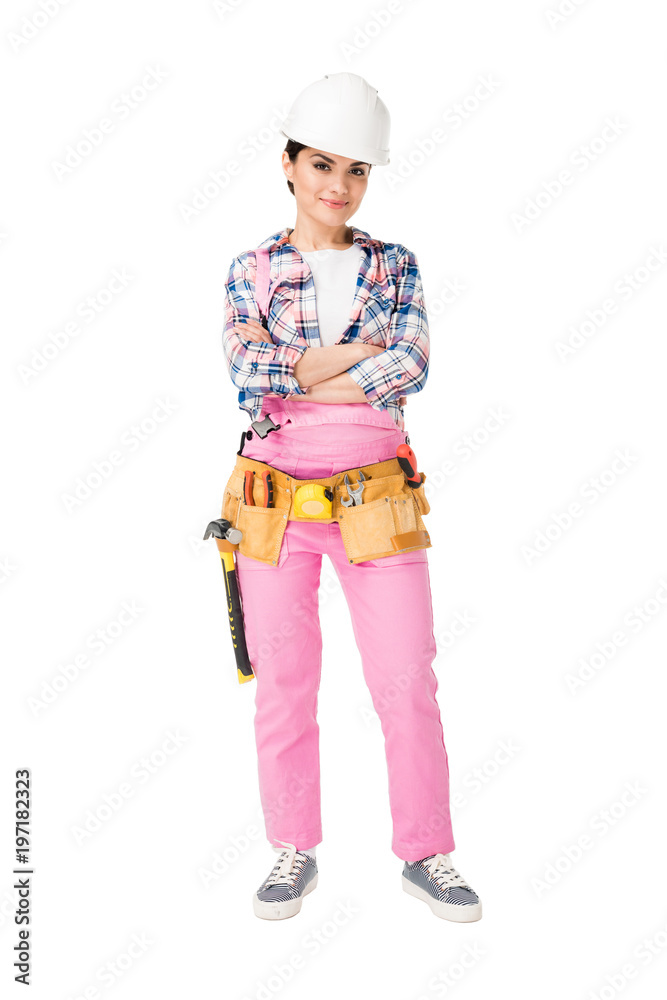 Professional female builder in overalls and hardhat isolated on white Professional female builder in overalls and hardhat isolated on white