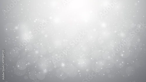 Grey glitter sparkles rays lights bokeh Festive Elegant abstract background.
